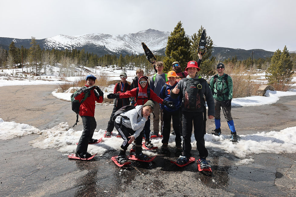 A group of students on their snowshoe hike during JPII Outdoor Lab week. AH Staff